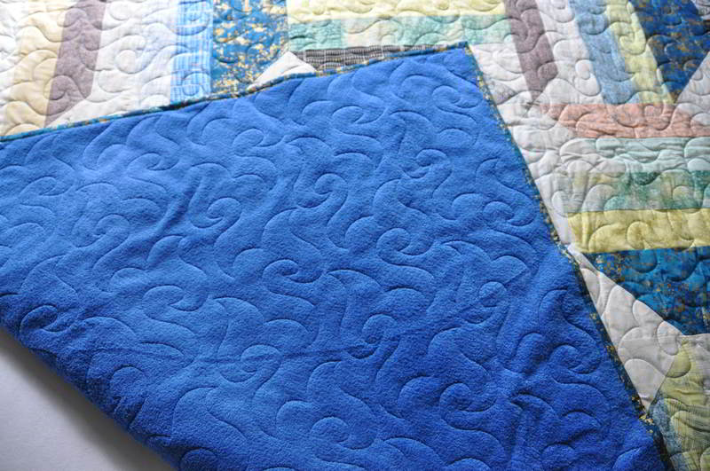 A shot of folded corner showing backing fabric.