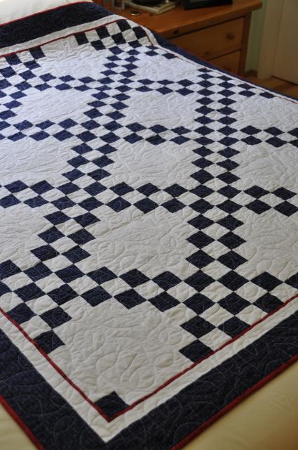 Angle view of front of Double Irish Chain quilt to show double chain more clearly.