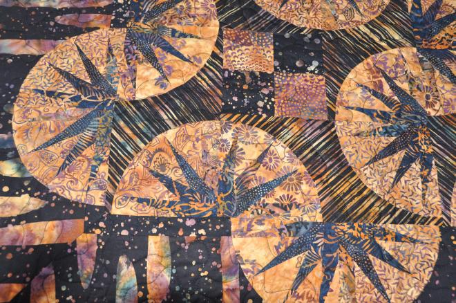 Close up of the half circles on the Drunkard's Wave quilt.
