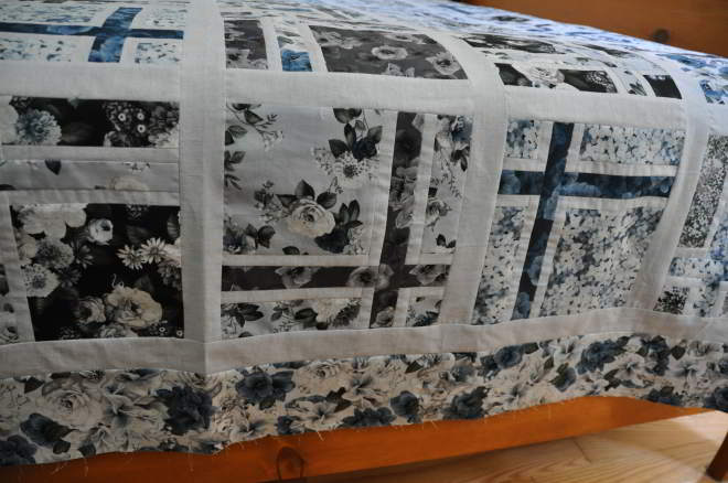 A from the side giving an idea of how large the quilt is. Also shows the border.
