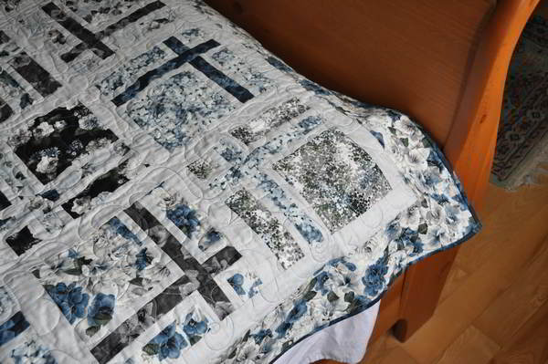 Shot of corner of completed quilt.