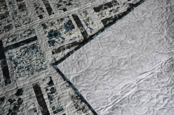 Shot of corner of completed quilt.