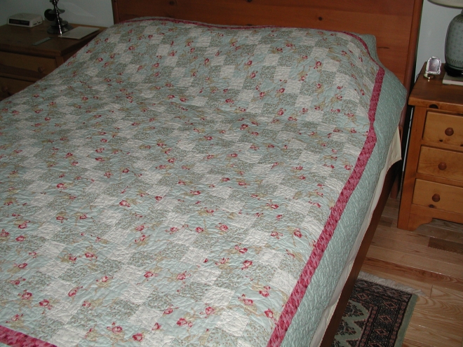 Basic four patch pattern called Four-Get Me Not. Barbara's second quilt.