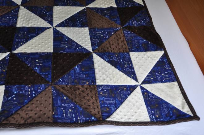 A closer look at the design and fabrics used in the quilt.
