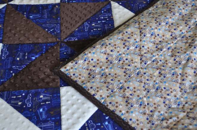 The flannel used for the backing carries over the colour scheme from the front.