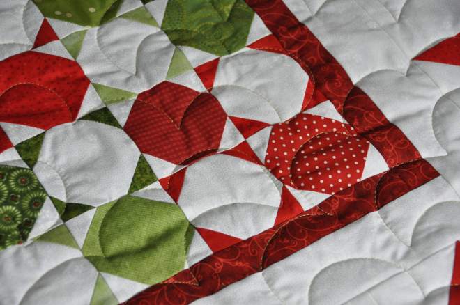 A closer look at the rounded elements in the centre of the Summer Slices quilt.
