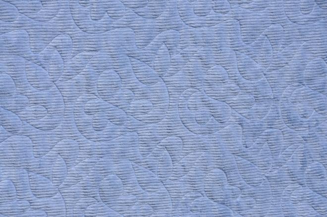 Close up of the backing fabric, called '?'.