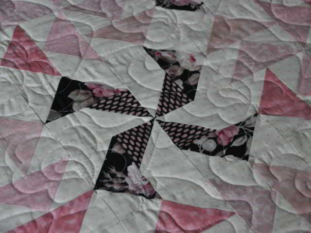 Green and white log cabin quilt, Barn Raising pattern.