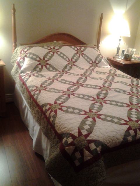 the quilt on its bed in Moncton