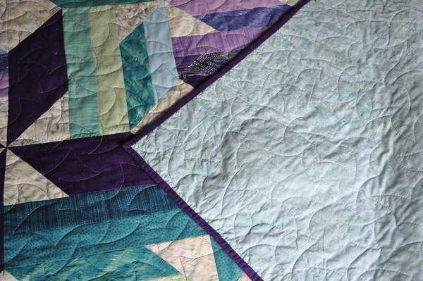 A shot of folded corner showing backing fabric.