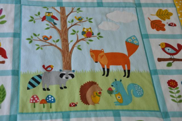 A close up of the center section the Woodland Friends quilt.